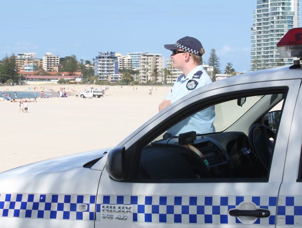 Police officer Nathan Breberg keeps a keen eye on Coolangatta Beach. Police officer Nathan Breberg keeps a keen eye on Coolangatta Beach.